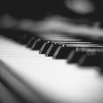 Elegant black and white close-up of piano keys, showcasing a monochrome artistic view.